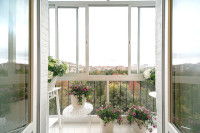 Французские окна в пол на балконе